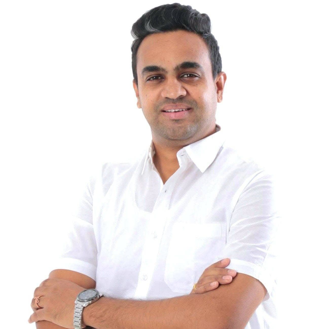 Portrait of Manesh Chandran